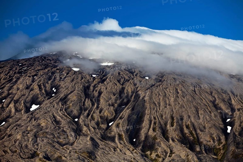 Volcano and glacier Snaefellsjokull with summit in clouds