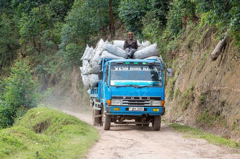 Fully loaded truck on sand road