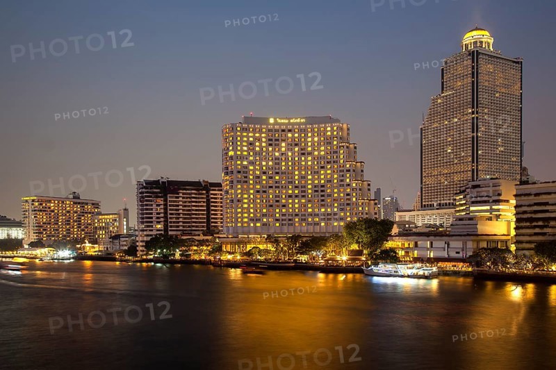 Lebua State Tower with hotel on the Chao Praya River