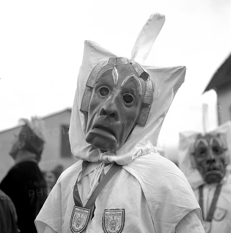 Man with sad looking mask
