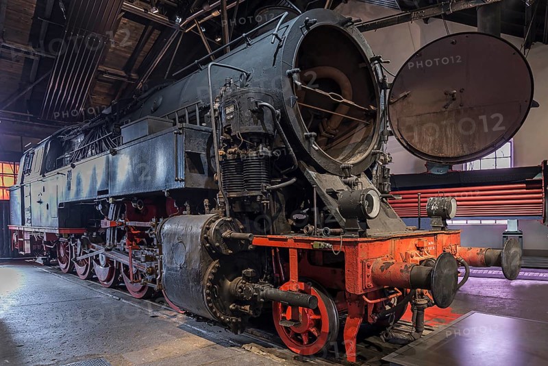 Tender locomotive 95 016 with open smoke chamber in a former railway depot