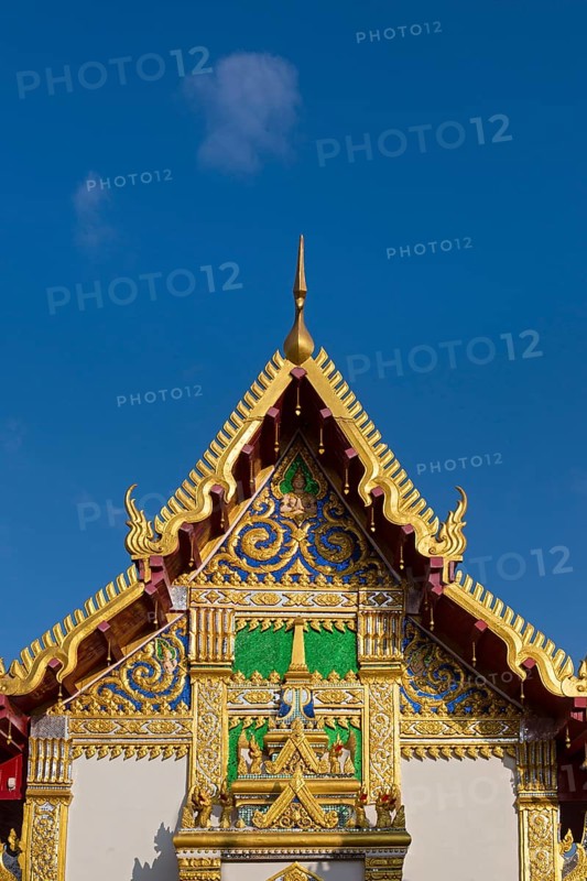 Pediment of the Bot in front of the Chedi of Wat Phra That Phanom