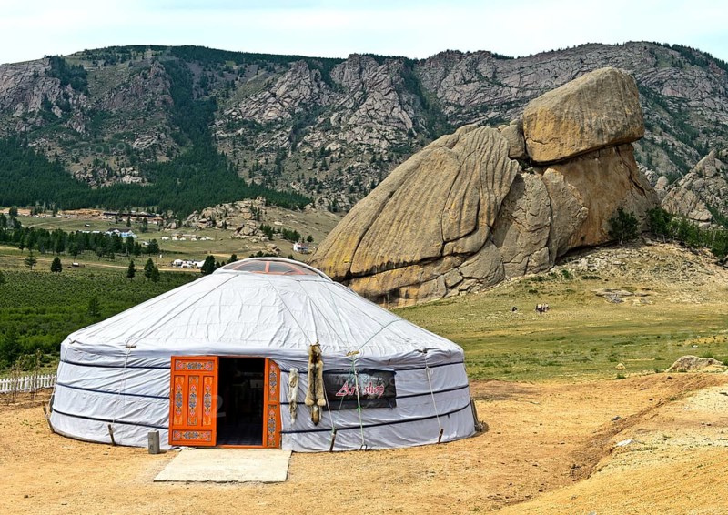 Yurt in front of the rock formation turtle