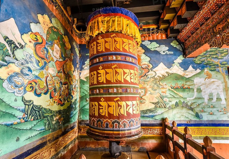Prayer mill and mural painting in the monastery fortress