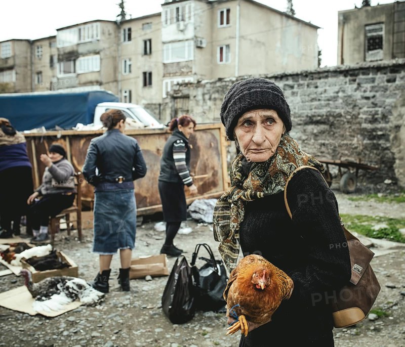 Woman with Chicken