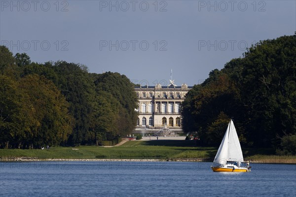 Sailing boat passing the Schloss Herrenchiemsee Castle