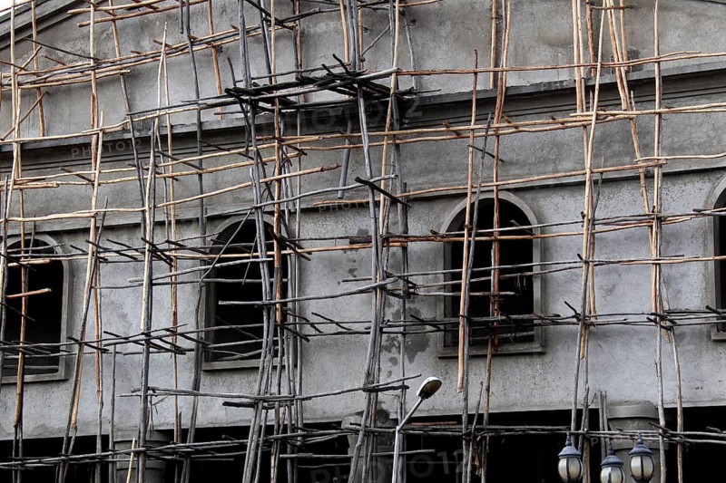 Wooden scaffolding on house wall