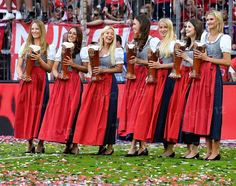Young ladies with wheat beer for beer shower