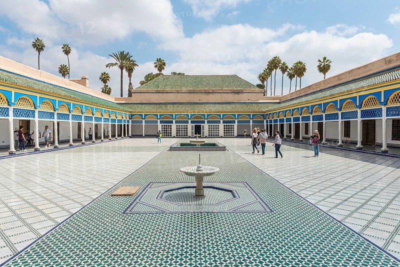 Ornate courtyard with columns and fountain