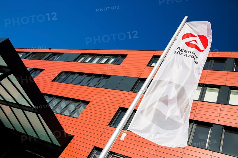 Flag in front of the new building of the Employment Agency