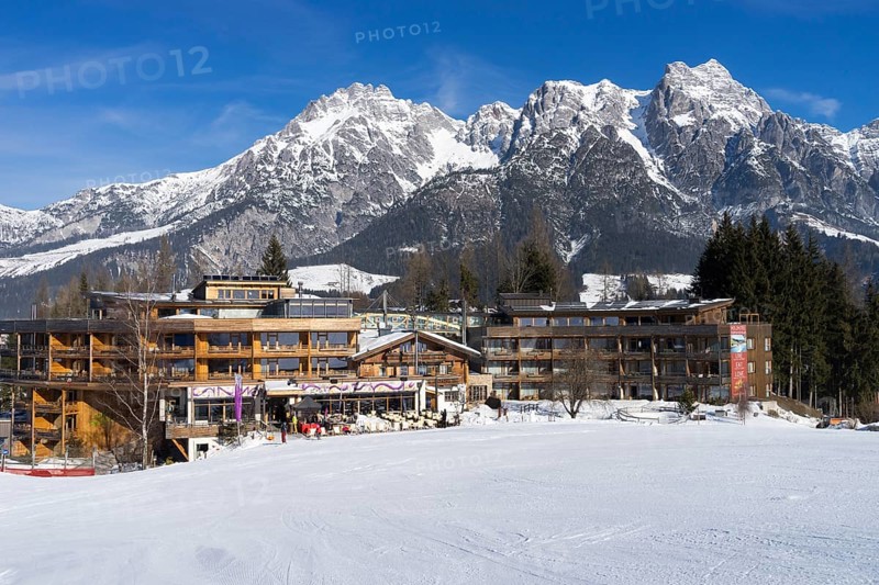 Holzhotel Forsthofalm in front of the Leoganger Steinbergen