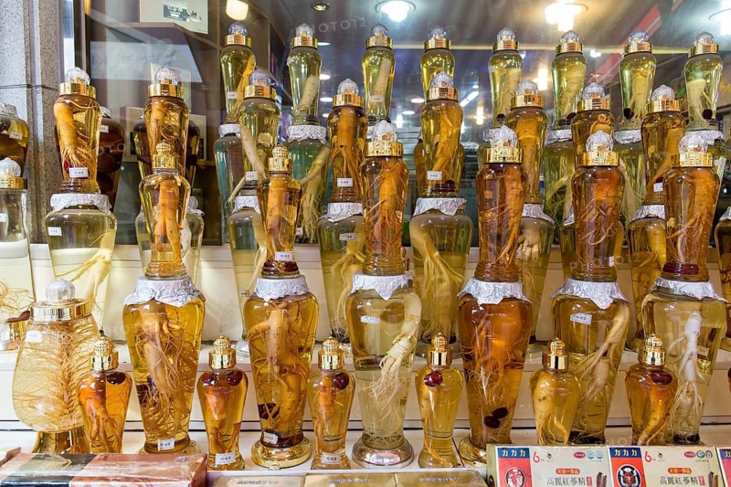 Ginseng in bottles at a market