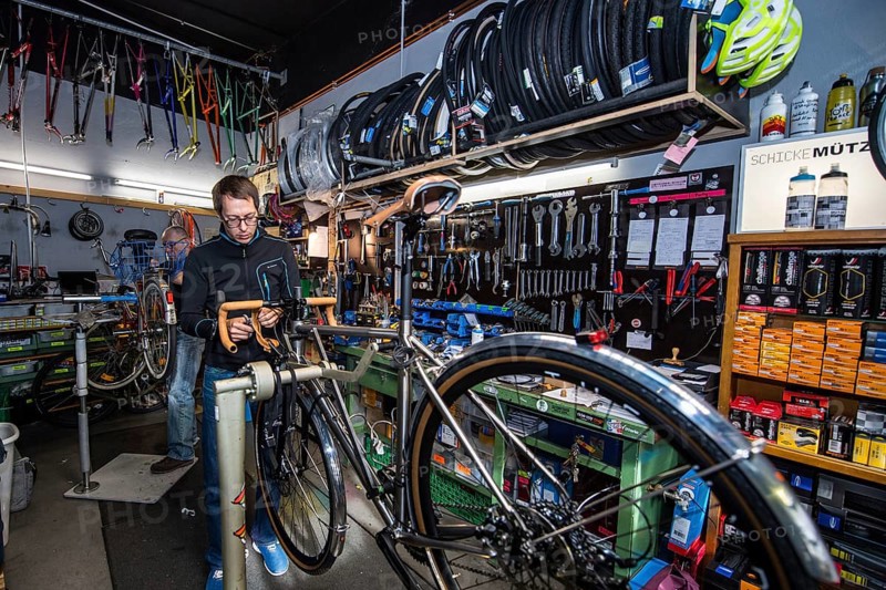 Man repairs bicycle