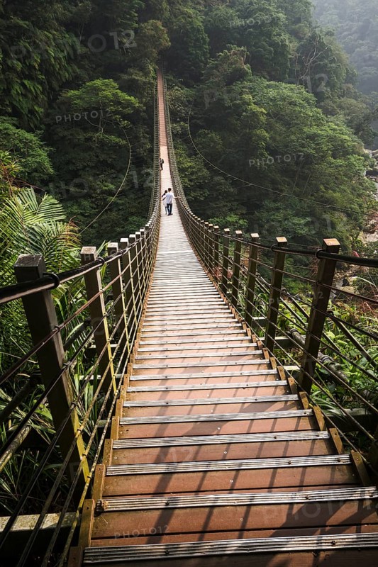 People on suspension bridge