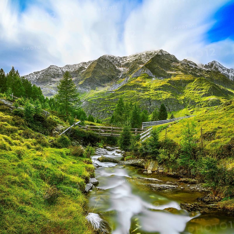 Stream flows through mountain landscape
