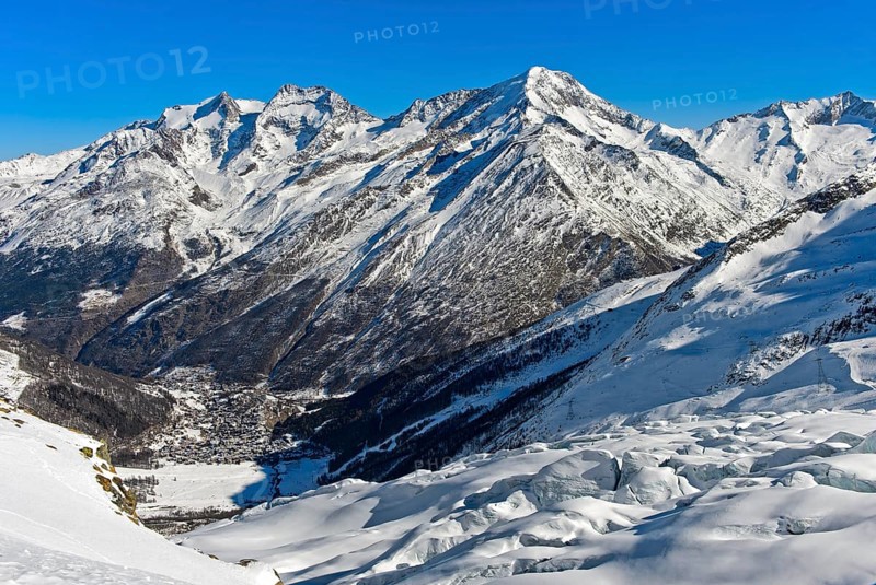 View from the Fee glacier into the valley with winter sports resort Saas-Fee