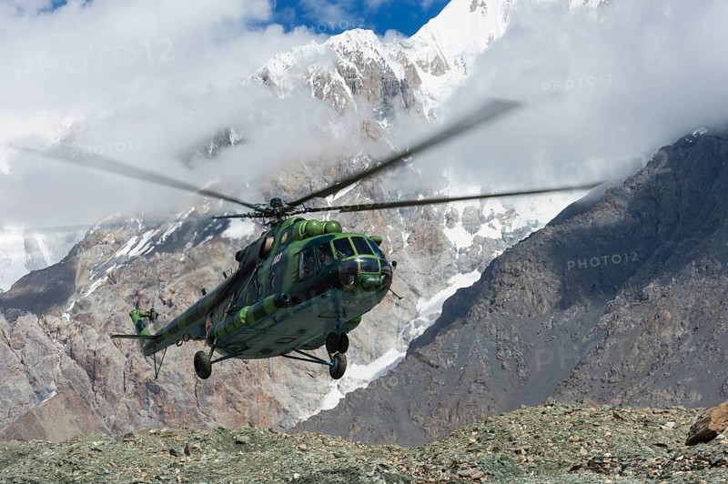 Helicopter landing at the Khan Tengri Base Camp