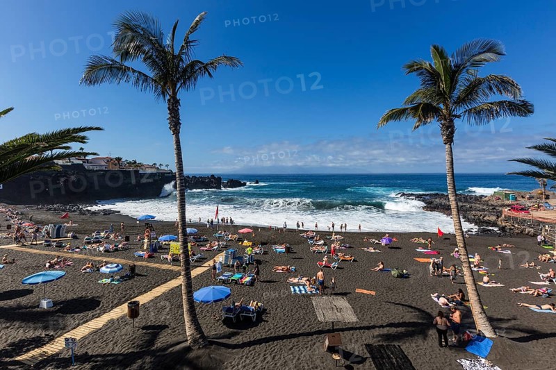 Tourists on the beach Playa da la Arena