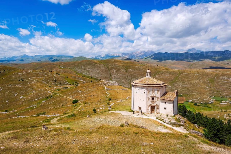Church Santa Maria della Pieta with mountain massif Gran Sasso