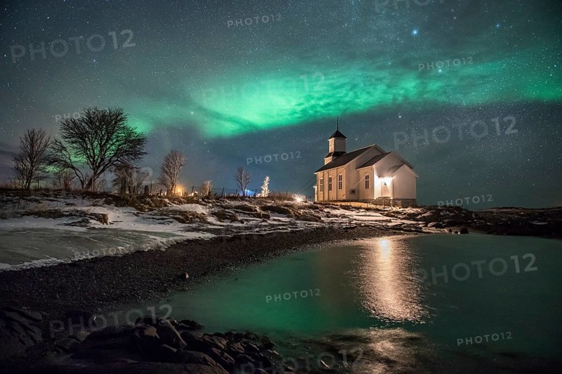 Northern lights over church of Gimsoy