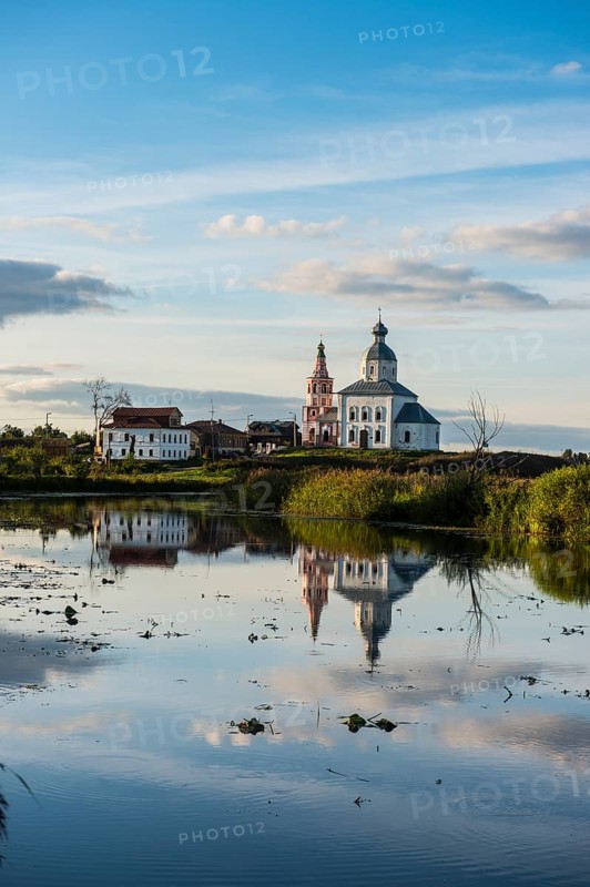 Abandonded church reflecting in the Kamenka river