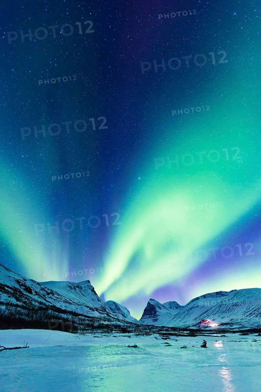 Northern Lights (Aurora borealis) over mountains
