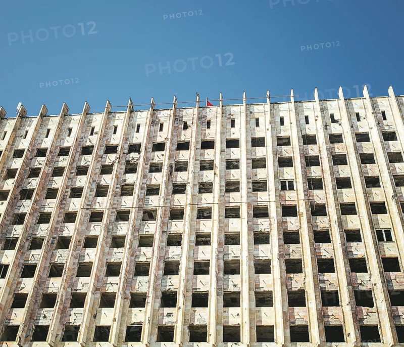 Facade of destroyed parliament building in Suchumi