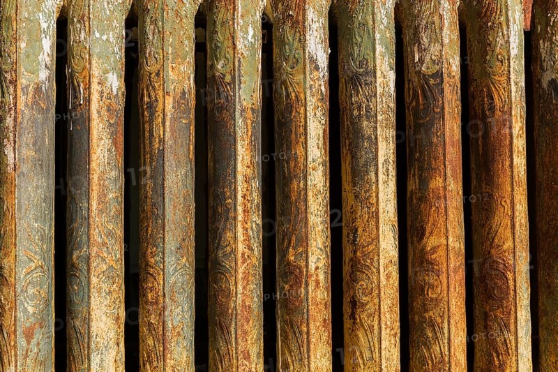 Close-up of rusted antique hot water heating radiator