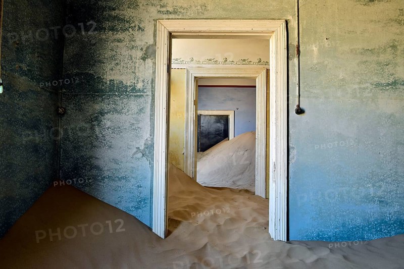Desert sand in the ruined building of the former diamond city