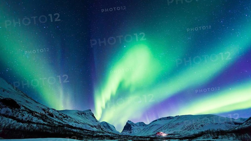 Northern Lights (Aurora borealis) over mountains
