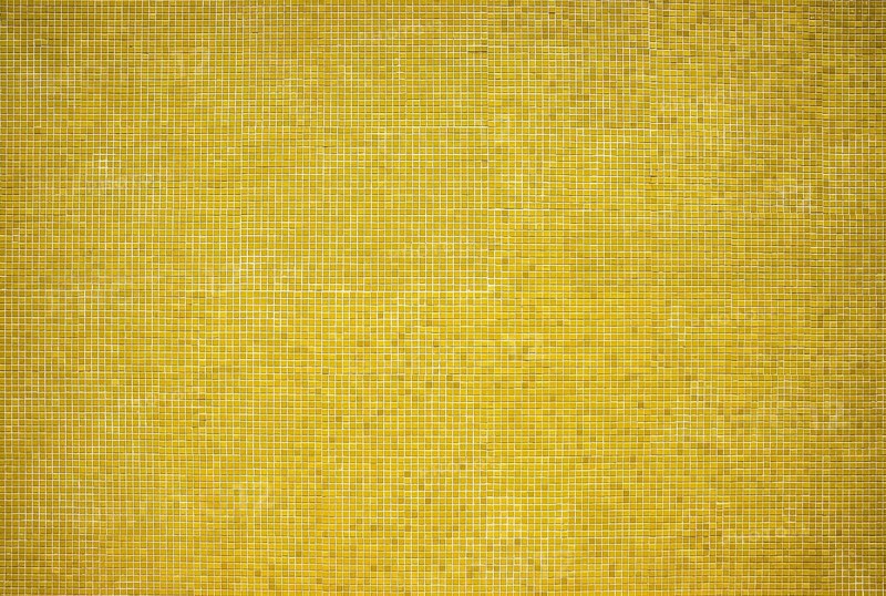 Wall decoration of small yellow mosaic stones