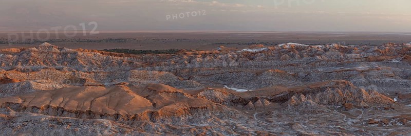 Bizarre red rock formations with white salt