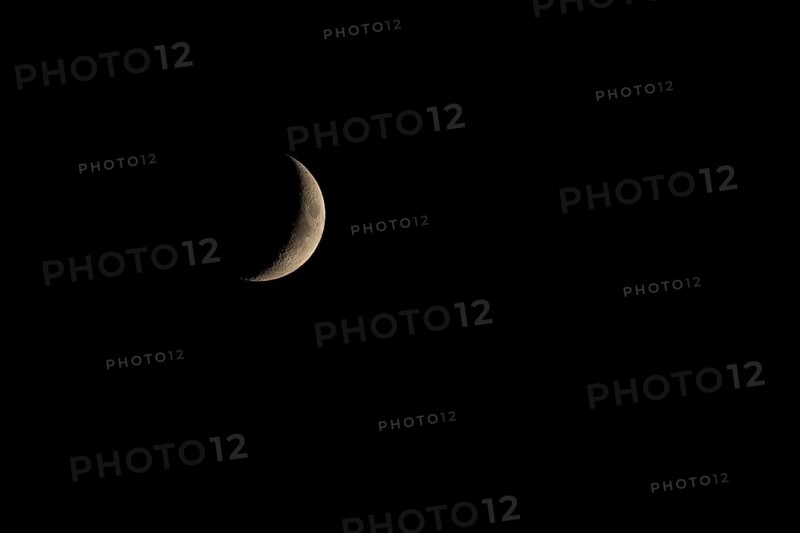 Crescent moon in the night sky