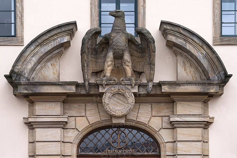 Former main entrance at the old building of the district court with Recihsadler and swastika removed in 1945