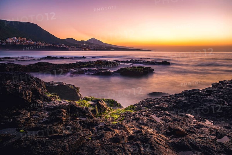 Rocky coast and sea at sunset