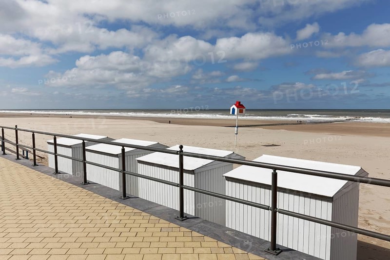 Beach with white beach huts near Blankenberge