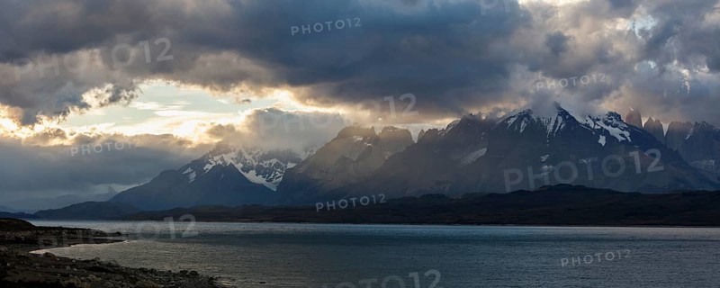 Glacial lake Sarmiento de Gamboa with the Cordillera del Paine mountain group in the evening light