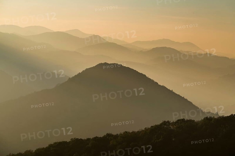 Hilly landscape in the haze
