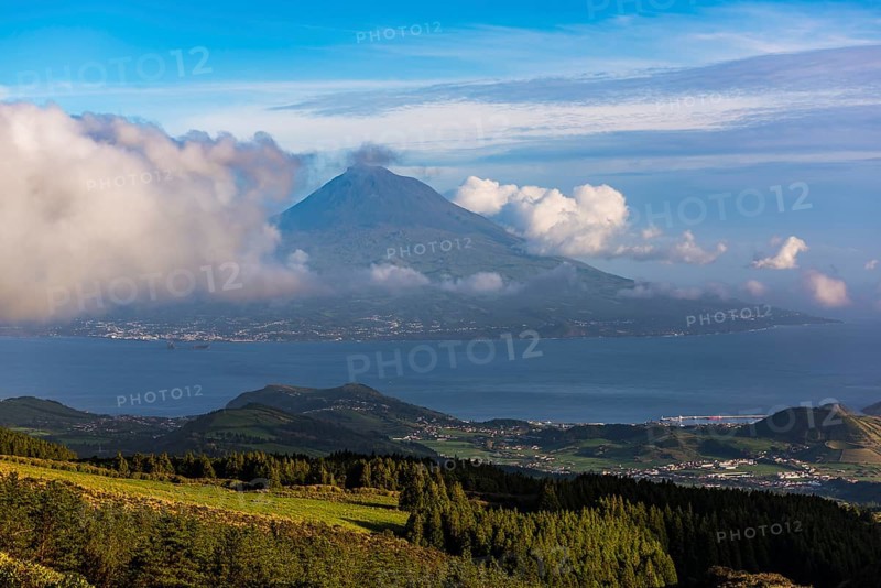 View of volcano Ponta do Pico with clouds