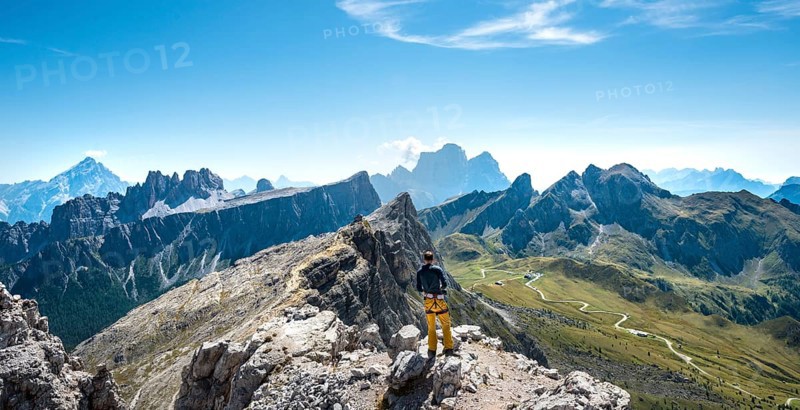 Hiker on the summit of the Averau