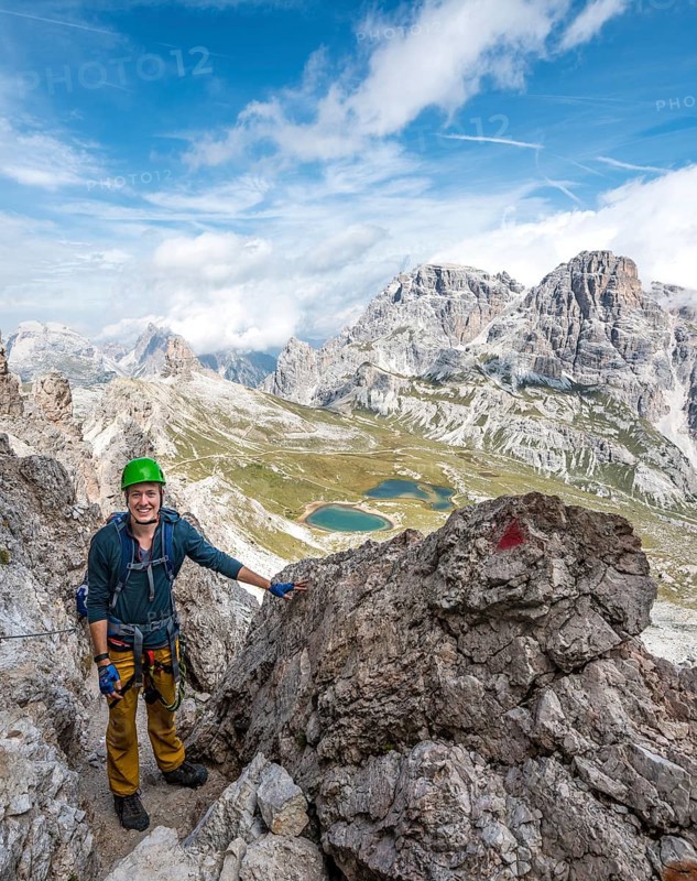 Hiker on the via ferrata to the Paternkofel
