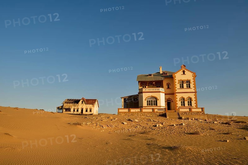 Decaying houses of the accountant and mine manager of the former diamond town Kolmanskop
