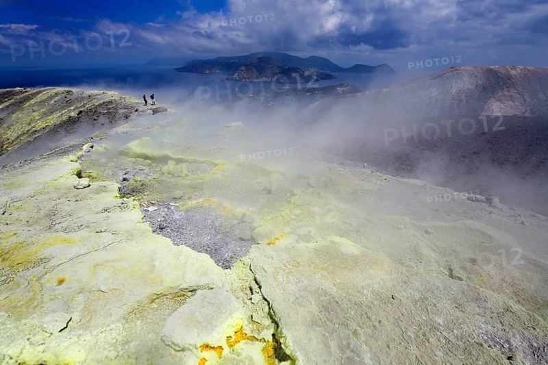 Sulfur fumaroles and chloride crusts on the crater rim