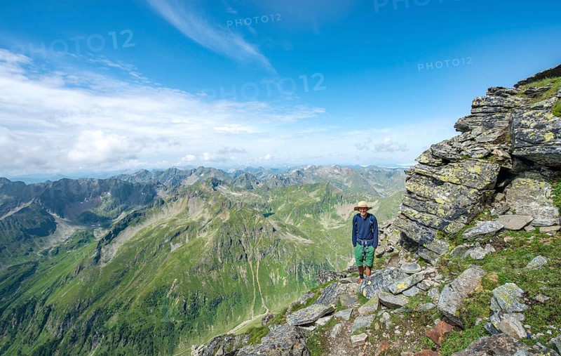 Hiker on the hiking trail to Hochgolling