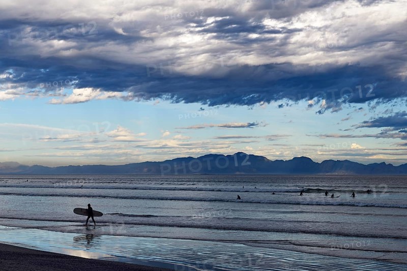 Surfers at the beach of Muizenberg