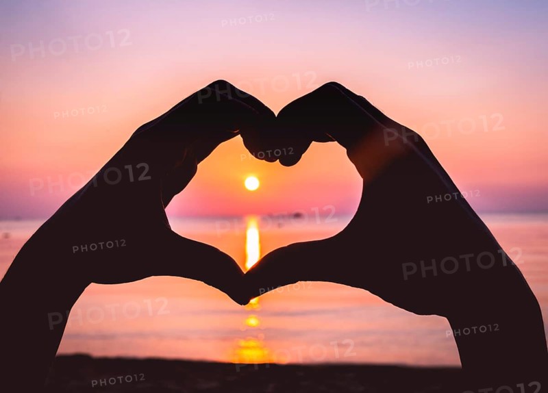 Hands form a heart