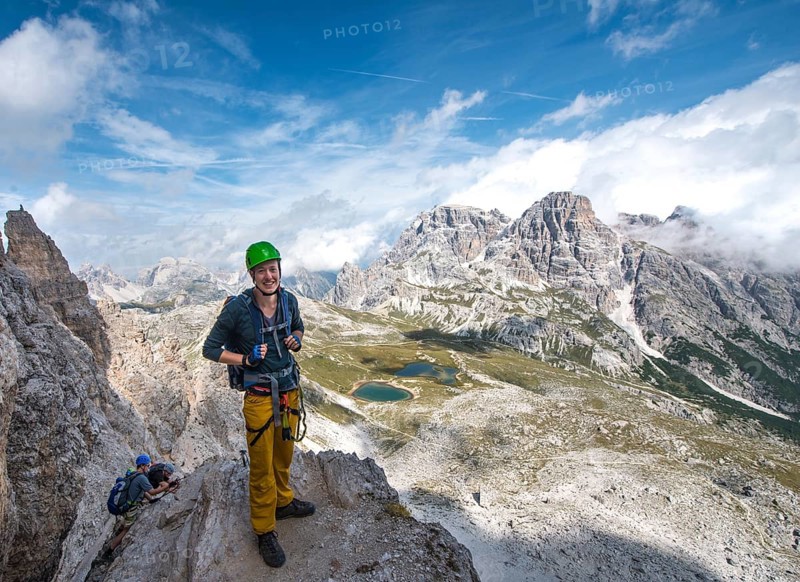 Hiker on the via ferrata to the Paternkofel