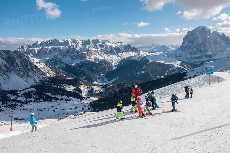 Children with ski instructor on the ski slope
