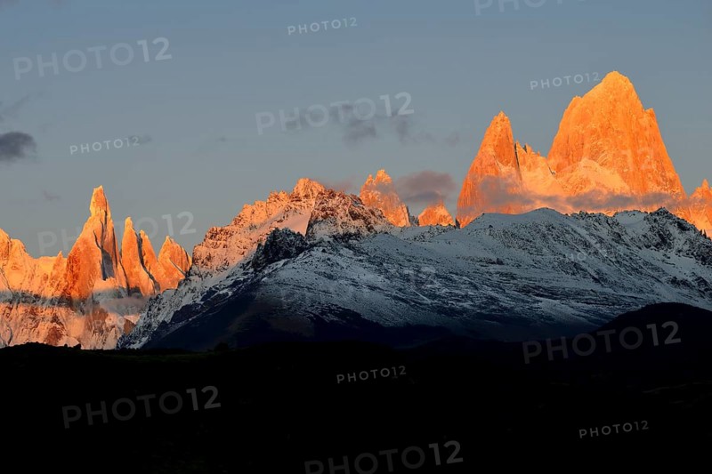 Snow-covered mountain range of the Fitz Roy and Cerro Torre at sunrise