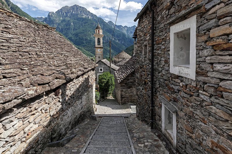 Typical Ticino stone houses and church in the village of Sonogno